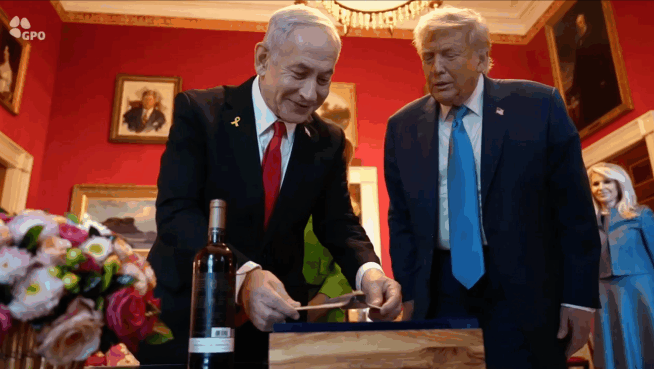 Israeli Prime Minister Benjamin Netanyahu presents U.S. President Donald Trump with a mezuzah in the shape of a B-2 bomber at the White House, July 7, 2025. (Screenshot from GPO footage)